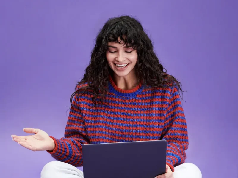 happy-girl-with-dark-long-wavy-hair-communicating-video-chat_